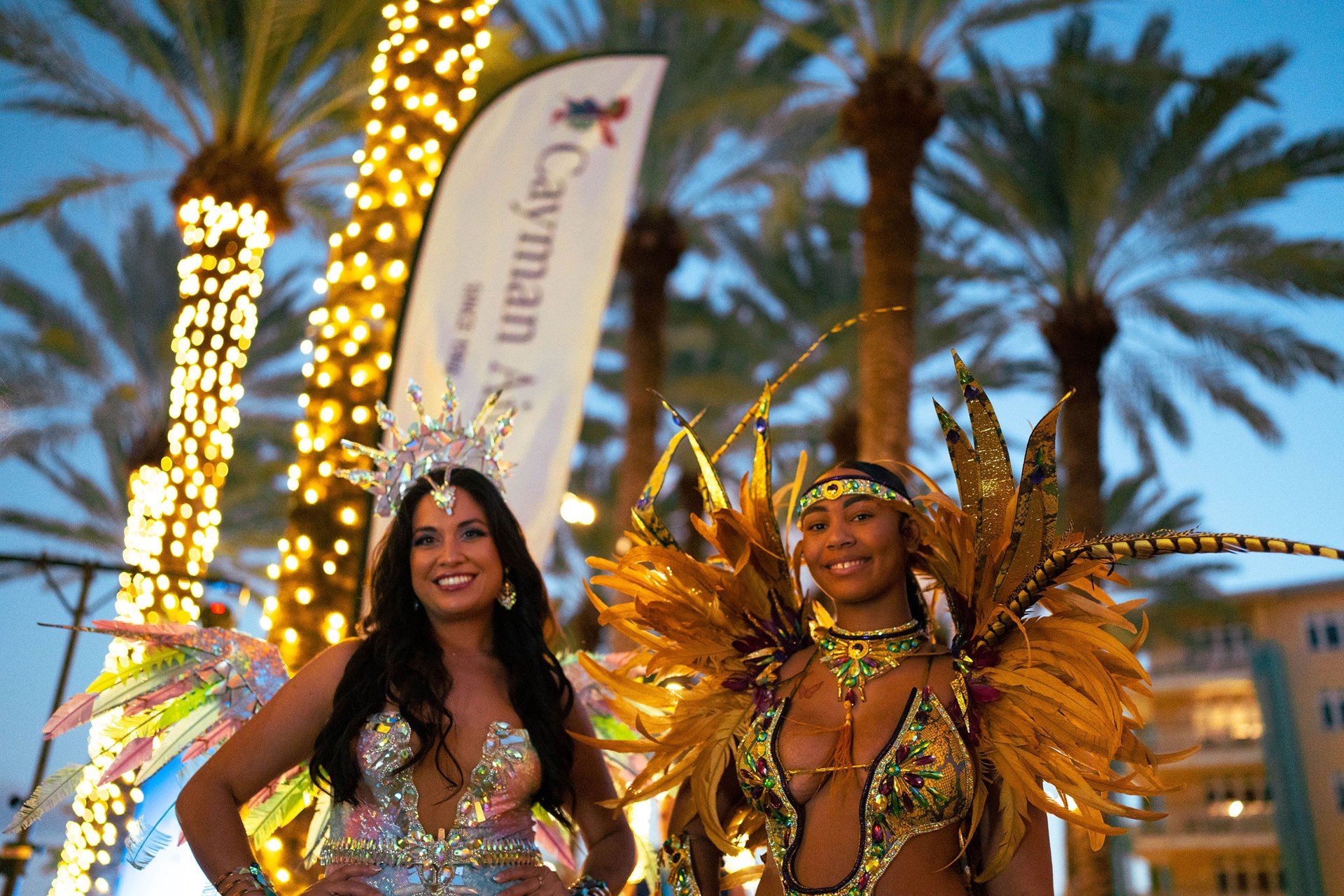 Two women in bright carnival costumes