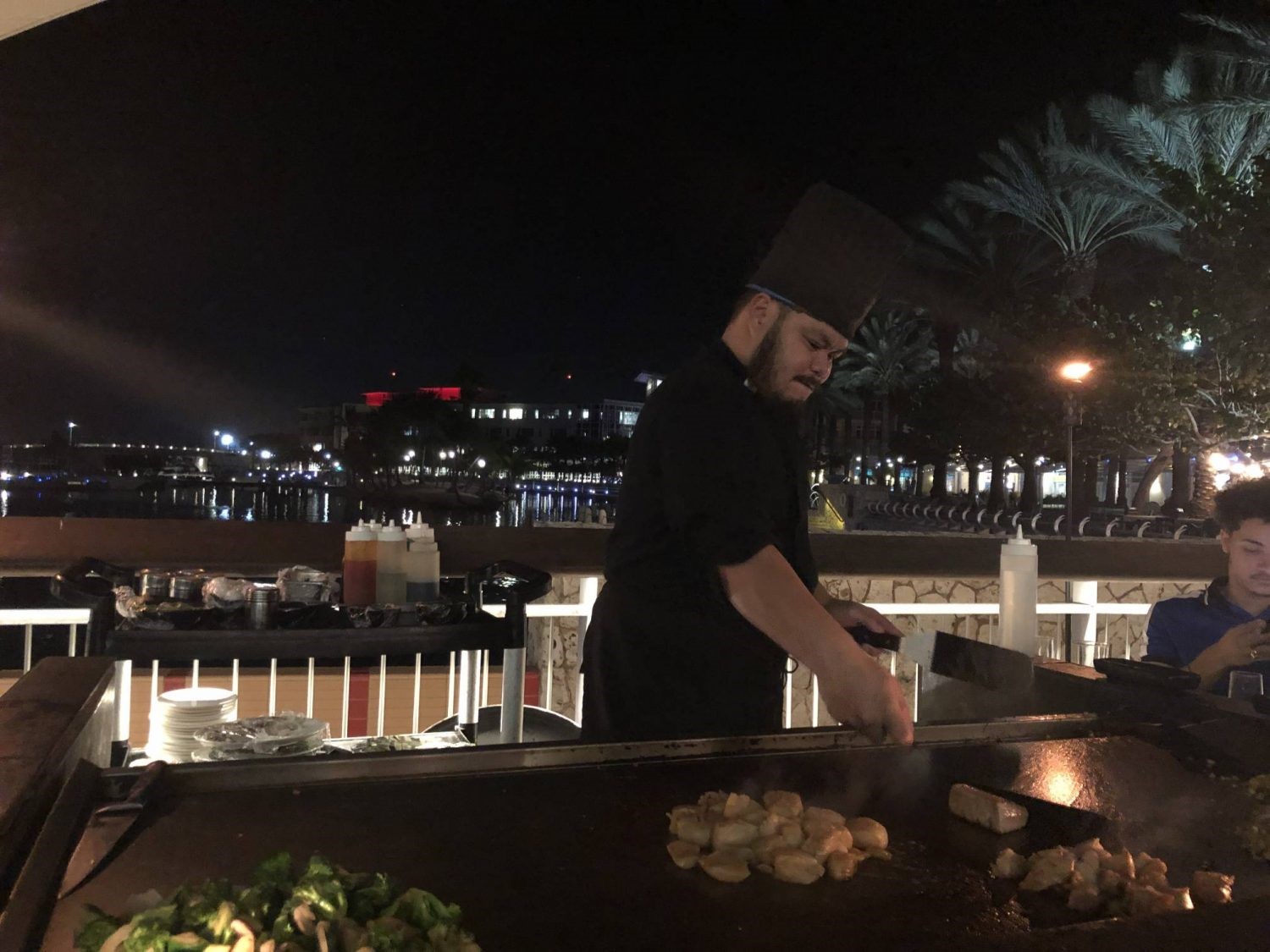 asian-chef-preparing-food-outside