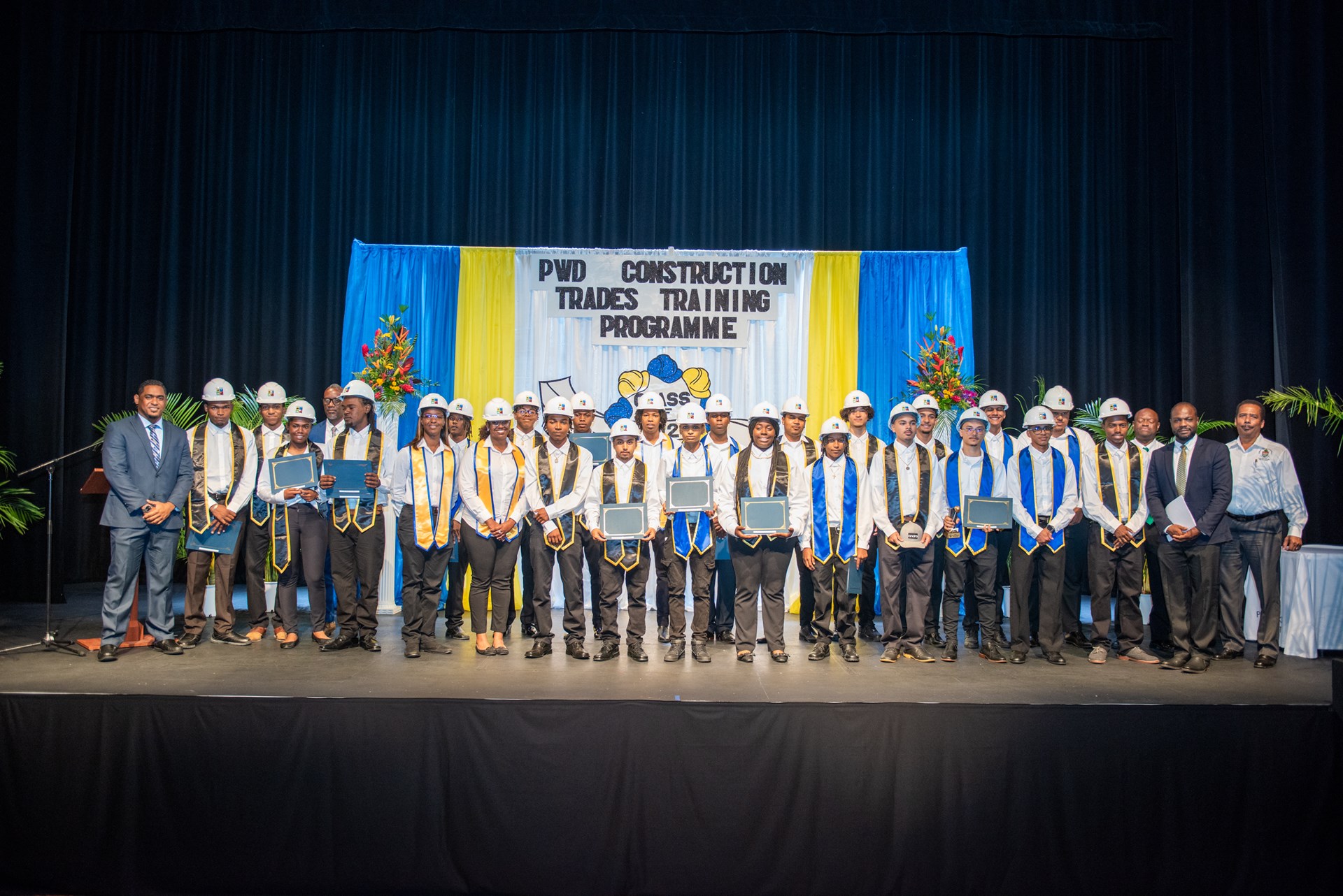 Graduates lined up on stage