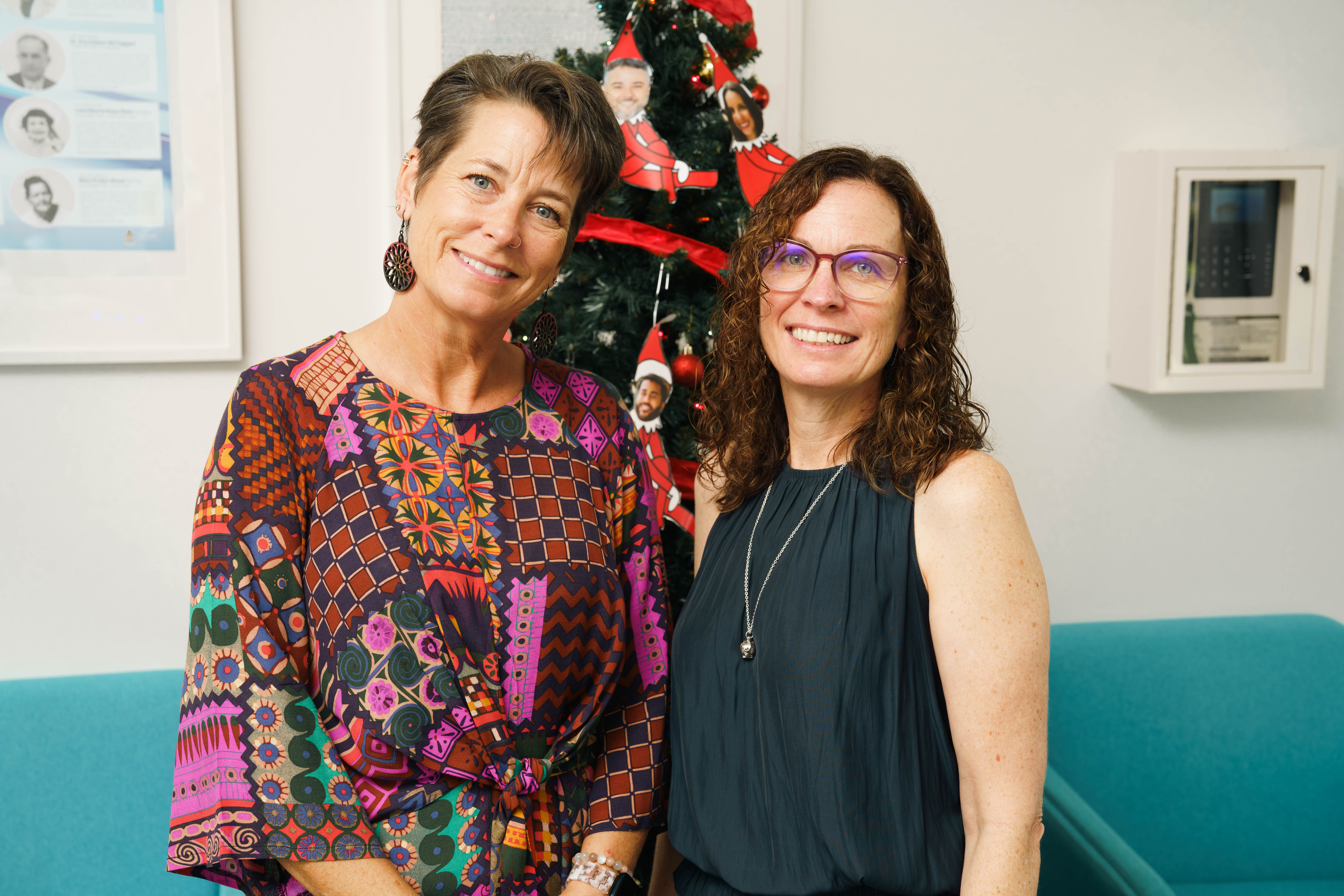 CIS counsellor Andie Urquhart, left, and Dr. Krista Finch have helped organise the students' efforts to give back.